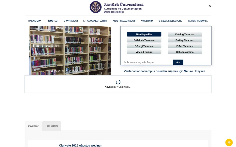 Atatürk Üniversitesi Kütüphane ve Dokümantasyon Daire Başkanlığı web sitesinin ana sayfası. Sayfada kütüphane raflarının olduğu bir görsel, arama kutusu ve farklı tarama seçeneklerinin bulunduğu buton