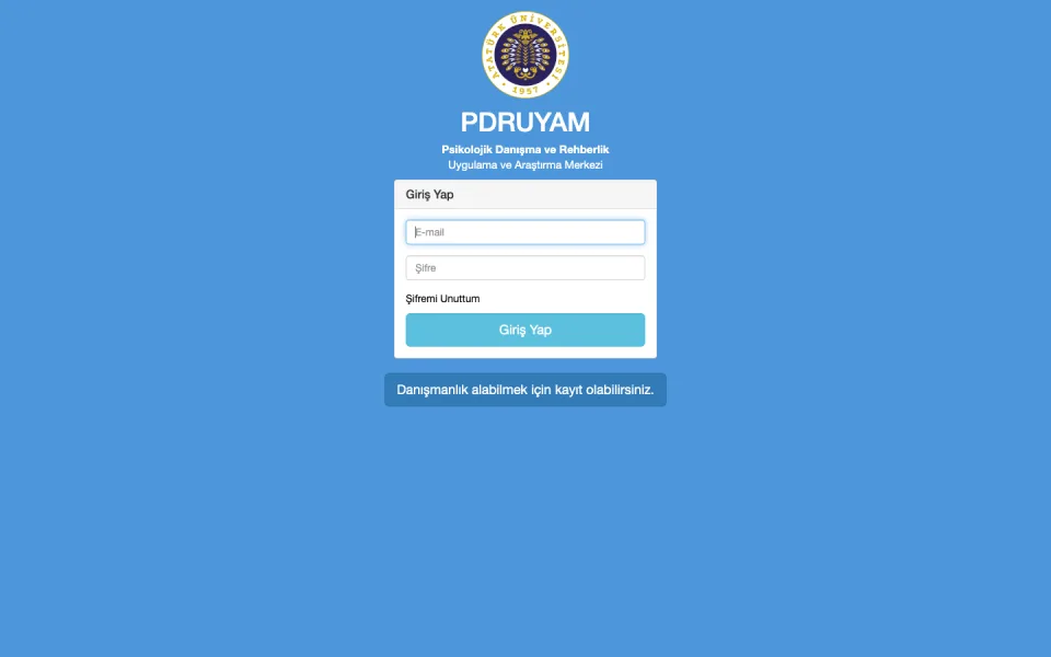 PDRUYAM Psikolojik Danışma ve Rehberlik Uygulama ve Araştırma Merkezi giriş ekranı; e-posta, şifre alanları, Şifremi Unuttum bağlantısı ve Giriş Yap butonu içeren bir form yer alıyor.